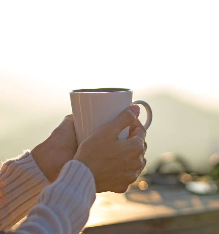 woman holding a cup